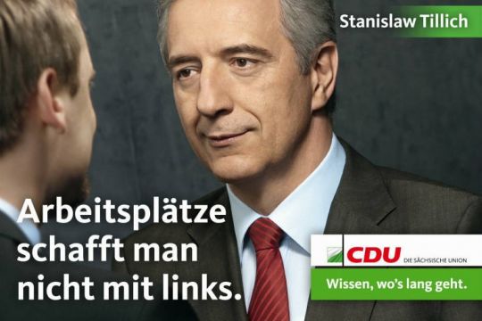 Stanislaw Tillich auf einem Wahlplakat, dazu der Text: "Arbeitsplätze schaftt man nicht mit links. CDU: Wissen, wo's langgeht."