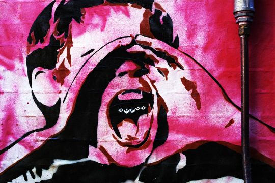 Graffiti mit schreiender Person