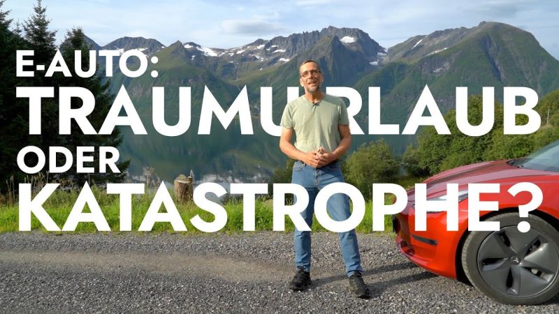 Aufmacherbild: Volker Quaschning in Freizeitkleidung neben seinem roten Elektroauto, im Hintergrund eine Berglandschaft.