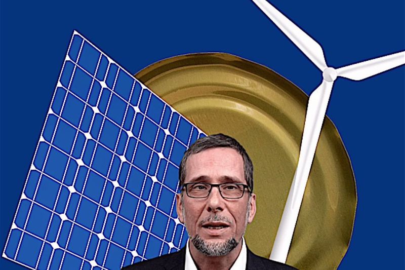 Aufmacherbild: Volker Quaschning vor blauem Hintergrund, wo ein Konservendosendeckel, ein Solarpaneel und ein Windrad angeordnet sind.